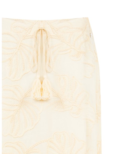 Saia midi rodada em algodão com bordados de folhas e franjas Rinascimento
