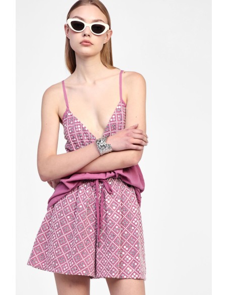 Calções com padrões e cinto Dixie