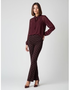 Calças boca-de-sino com pois flocados e elástico na parte de trás Rinascimento