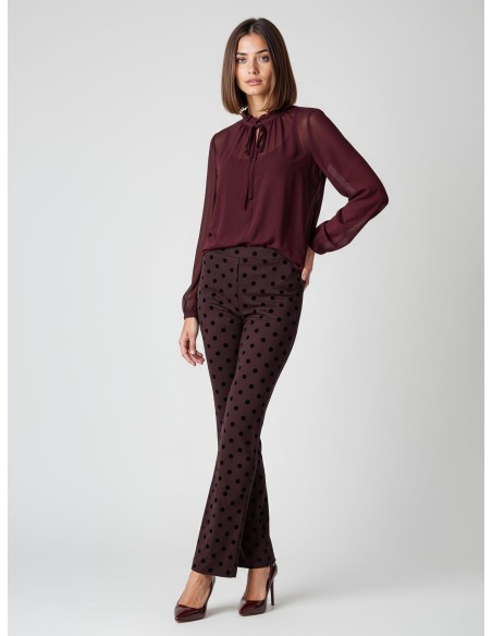 Calças boca-de-sino com pois flocados e elástico na parte de trás Rinascimento