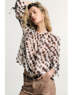 Blusa ampla com estampa de pois, mangas compridas e com lacinhos Please